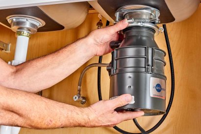 Why Water Leaks Under the Sink Could Be Linked to Your Disposal